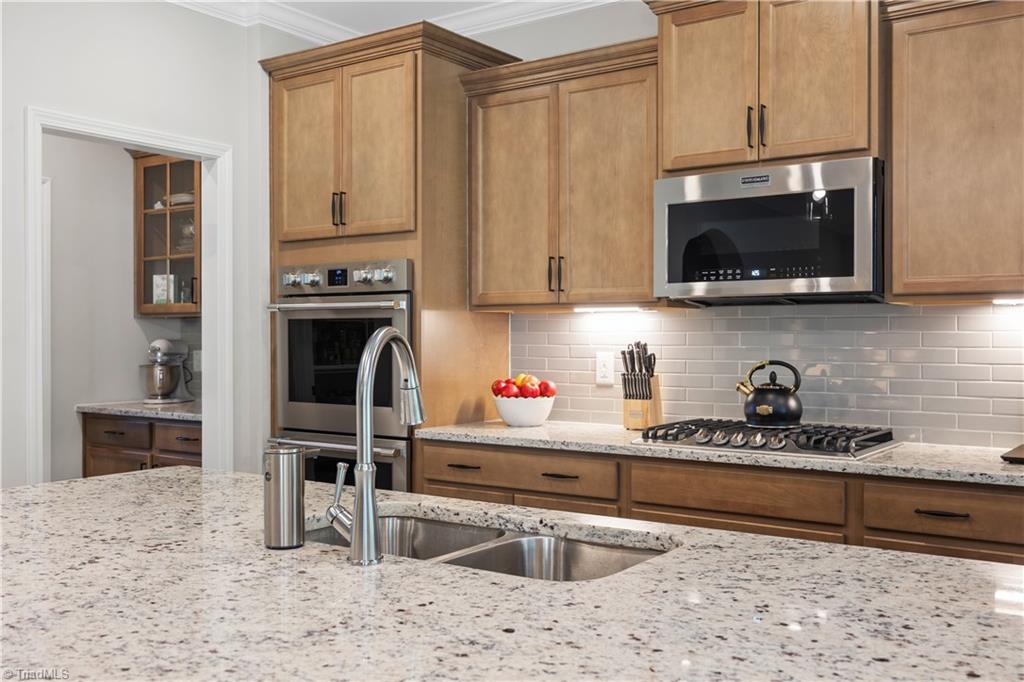 180 Moravian Advance, NC 27006 - Photo 4 of 34 Beautiful granite center island.