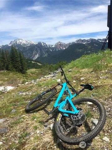 a view of a street with a yard