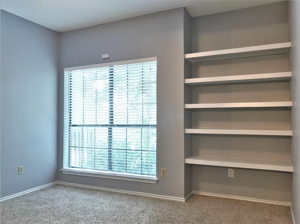 9601 Forest Lane, Unit 1313 Dallas, TX 75243 - Photo 7 of 19 a view of an empty room with a window
