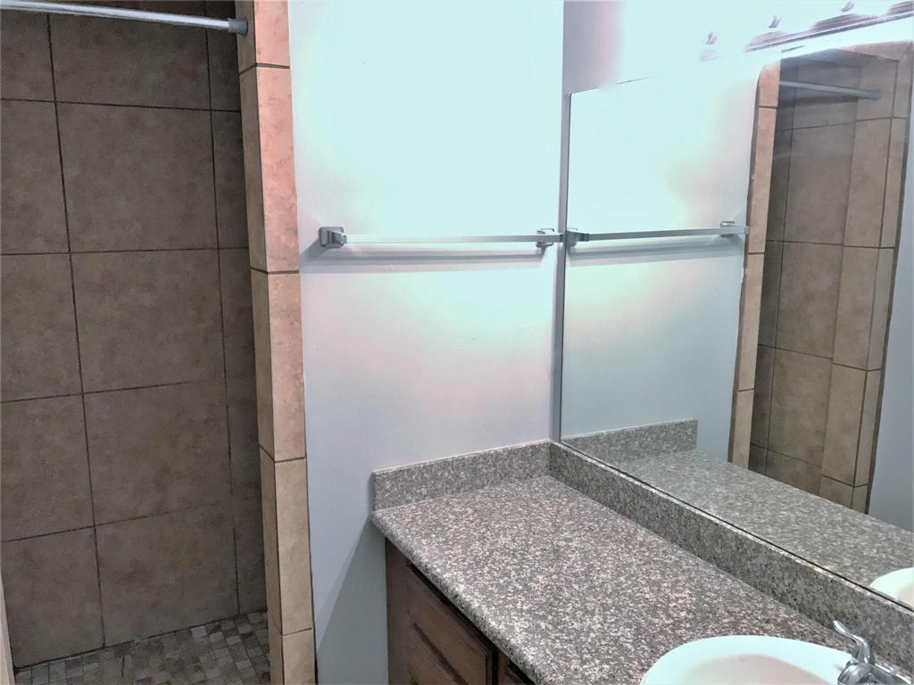 9601 Forest Lane, Unit 1313 Dallas, TX 75243 - Photo 10 of 19 a view of bathroom