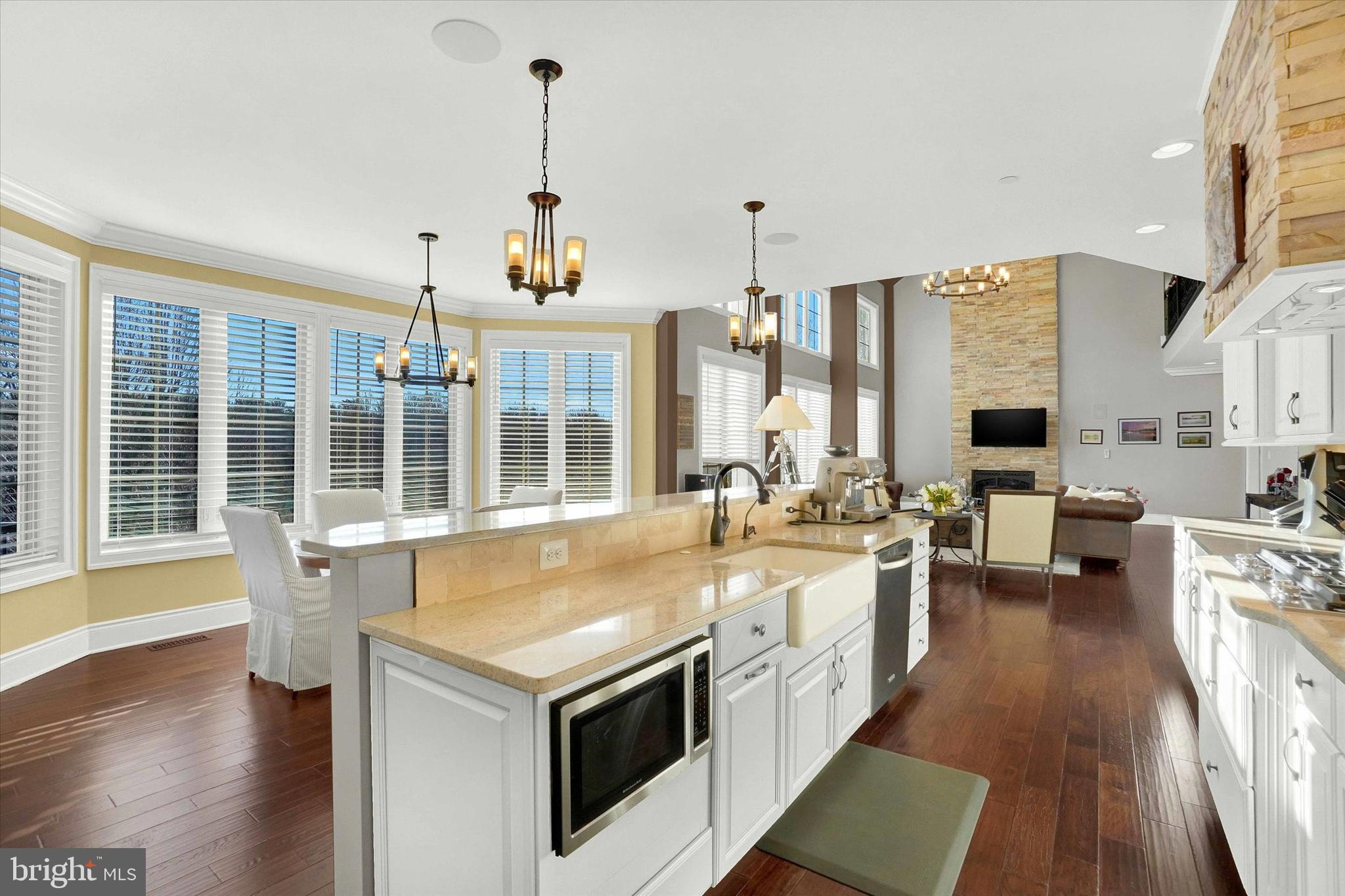 14507 Ventry Farm Court Sparks Glencoe, MD 21152 - Photo 14 of 87 a large white kitchen with a stove a sink a refrigerator and wooden floor