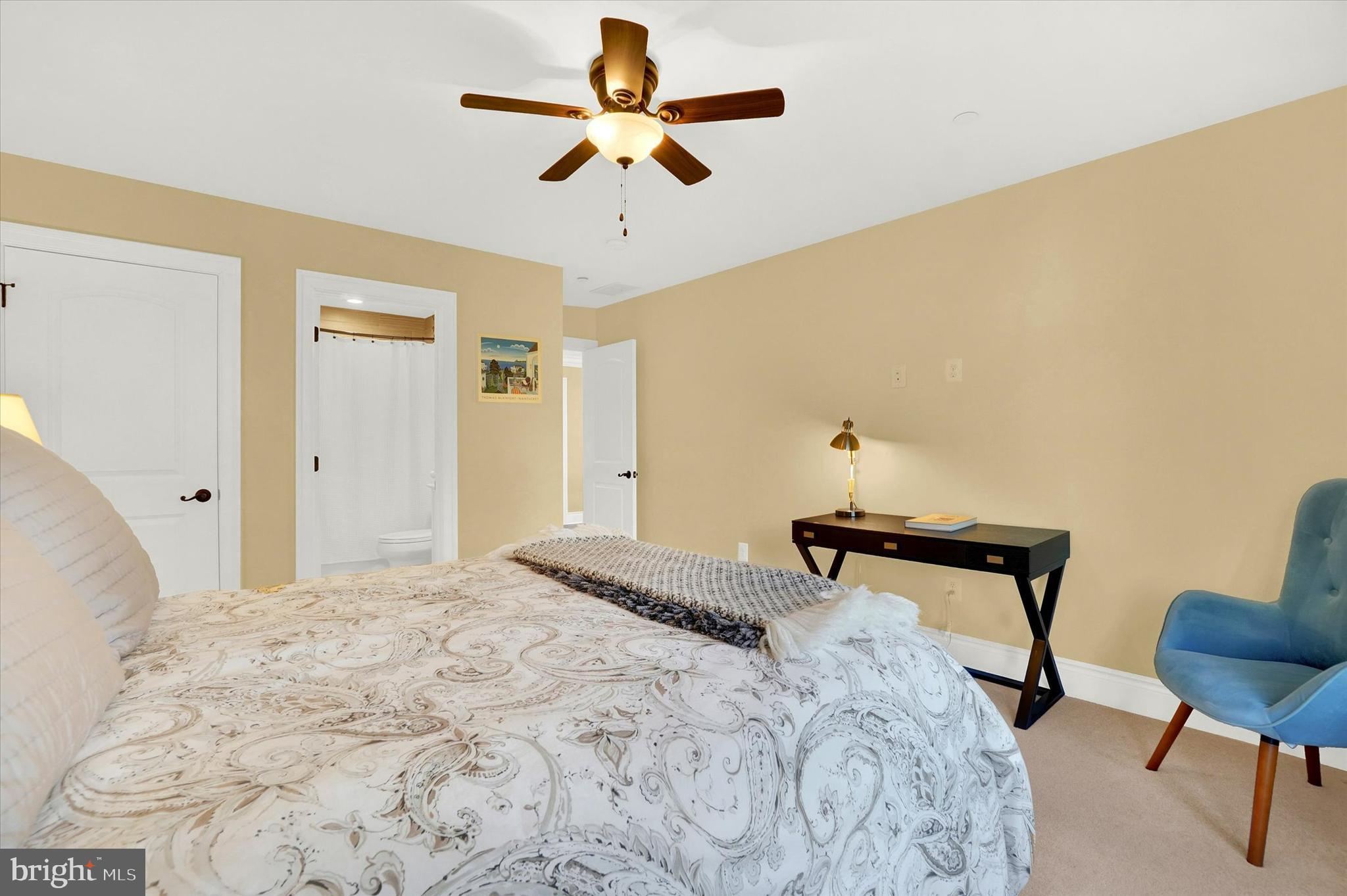 14507 Ventry Farm Court Sparks Glencoe, MD 21152 - Photo 37 of 87 a bedroom with a bed a chair and a potted plant
