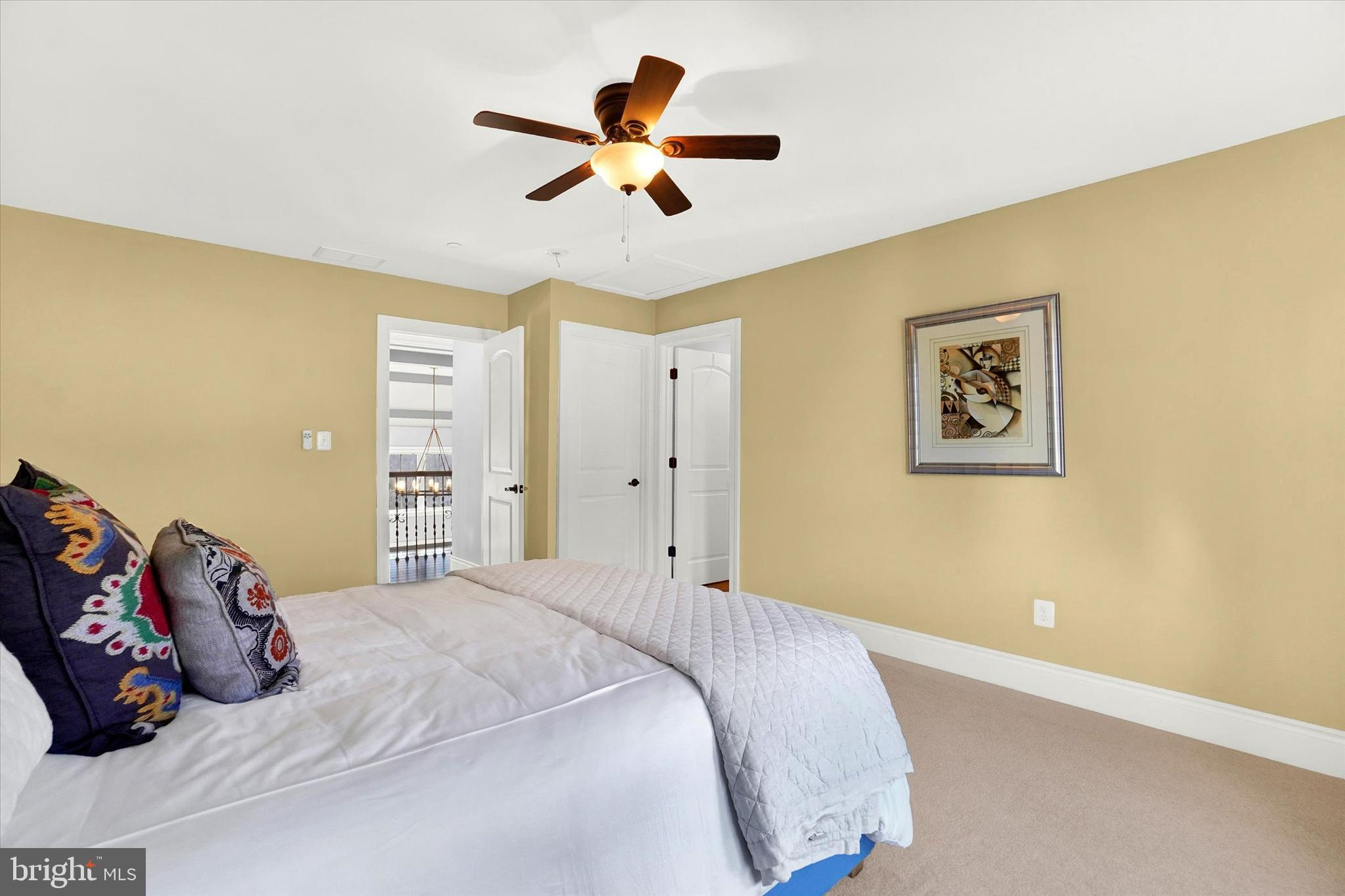 14507 Ventry Farm Court Sparks Glencoe, MD 21152 - Photo 40 of 87 a bedroom with a large bed and a ceiling fan