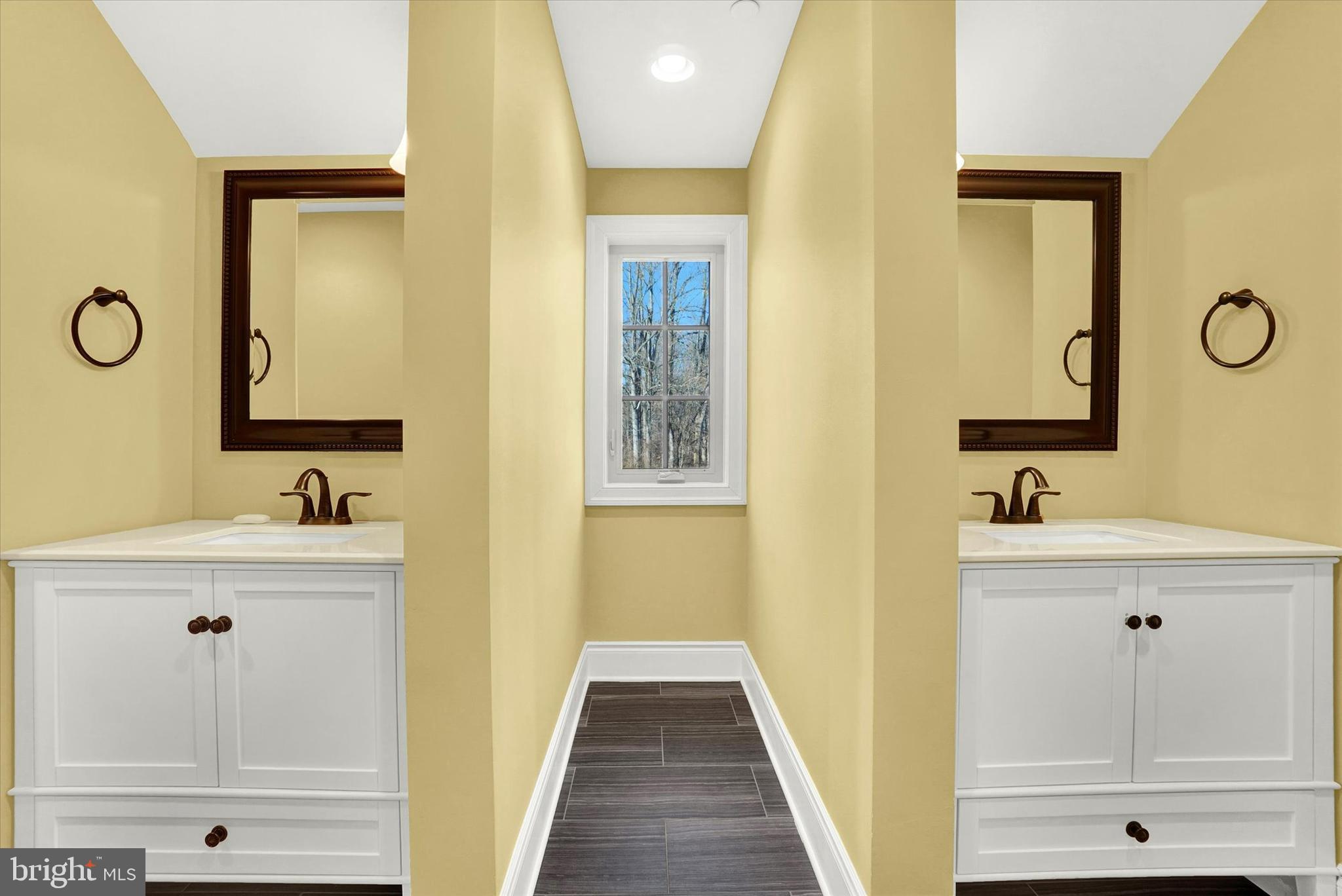 14507 Ventry Farm Court Sparks Glencoe, MD 21152 - Photo 42 of 87 a bathroom with a sink a mirror and a vanity