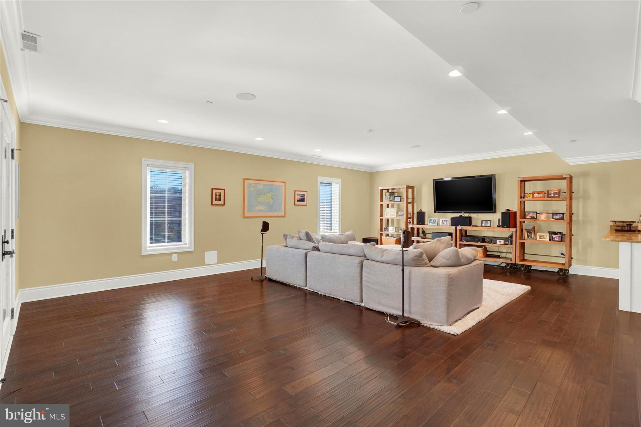 14507 Ventry Farm Court Sparks Glencoe, MD 21152 - Photo 52 of 87 a living room with furniture flat screen tv and wooden floor