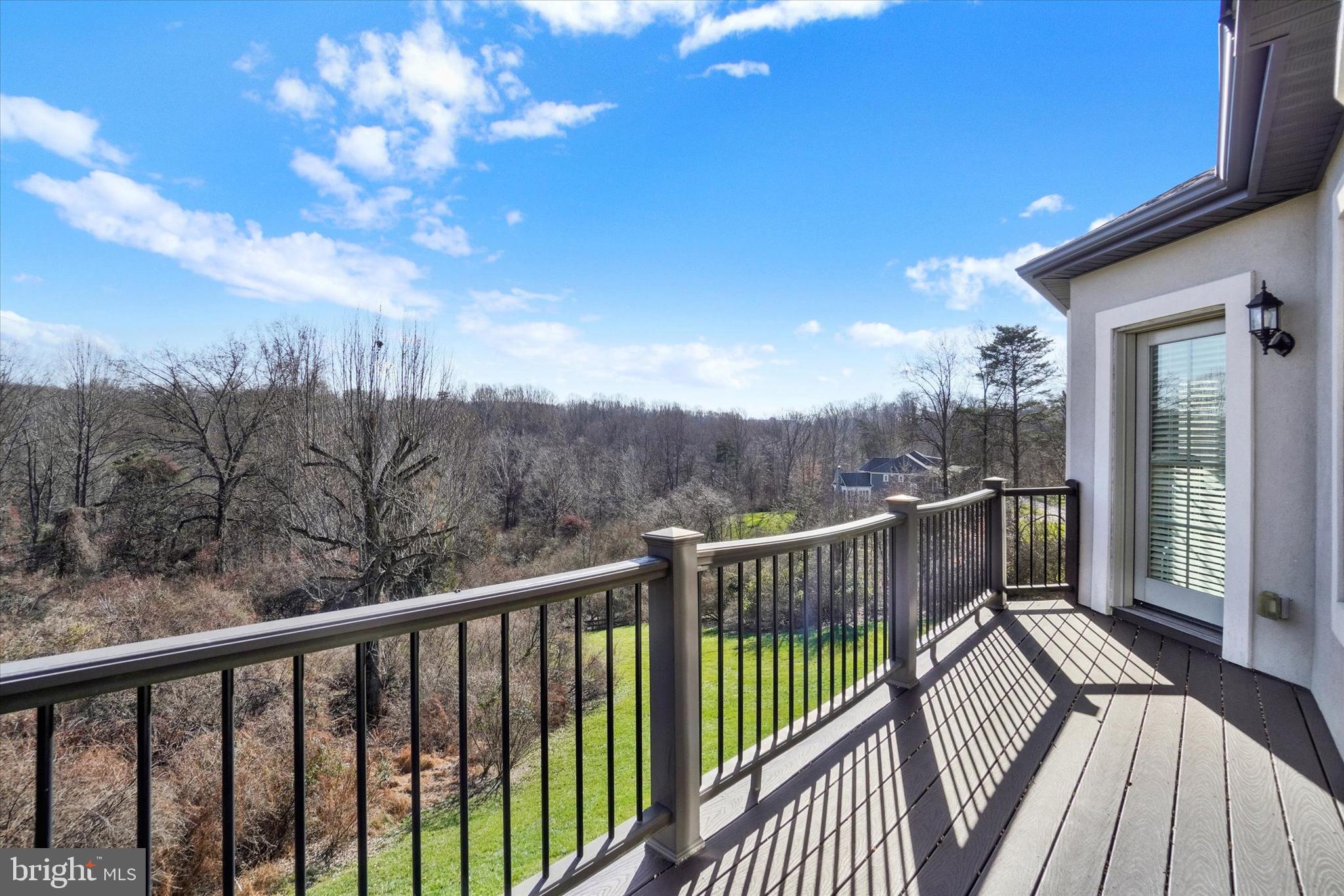 14507 Ventry Farm Court Sparks Glencoe, MD 21152 - Photo 69 of 87 a view of a balcony with wooden floor and fence