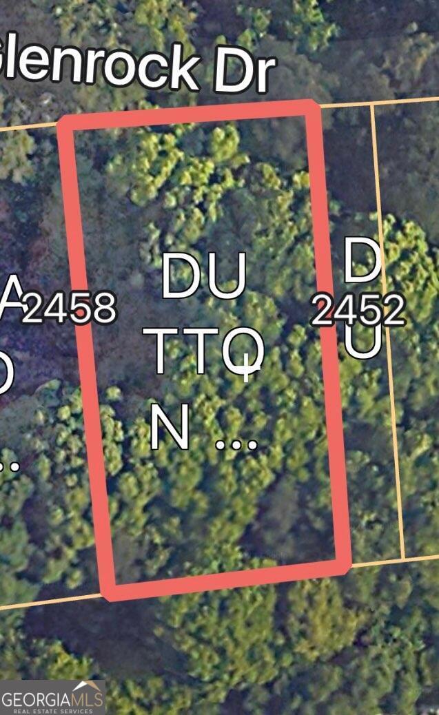 a sign that is on a brick wall