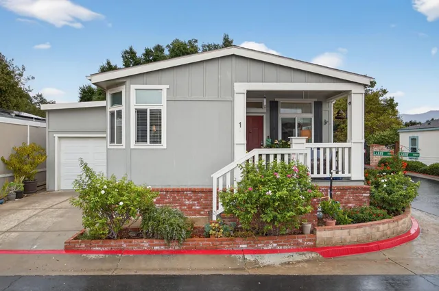 front view of a house with a small yard