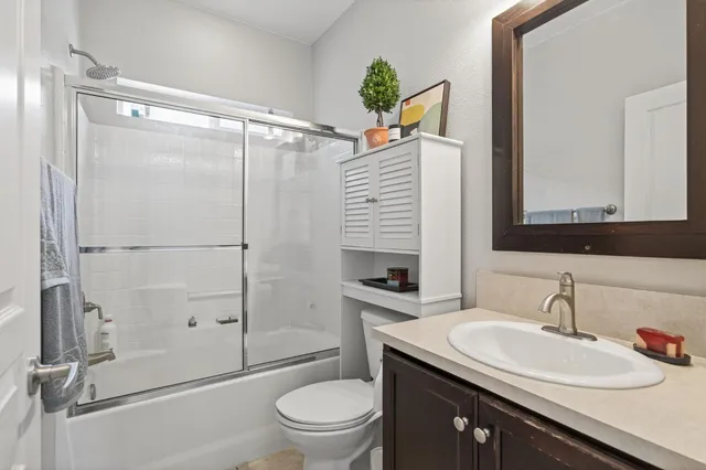 a view of a storage and utility room with a washer dryer
