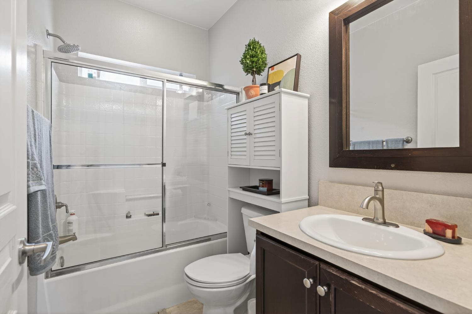 1885 Maricopa Highway, Unit 1 Ojai, CA 93023 - Photo 31 of 36 a bathroom with a sink toilet and shower