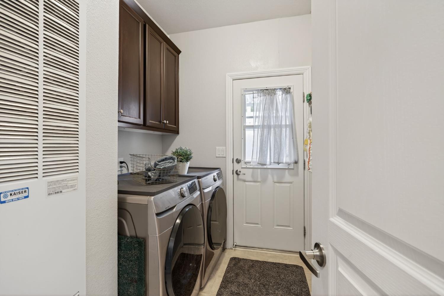1885 Maricopa Highway, Unit 1 Ojai, CA 93023 - Photo 32 of 36 a view of a storage and utility room with a washer dryer