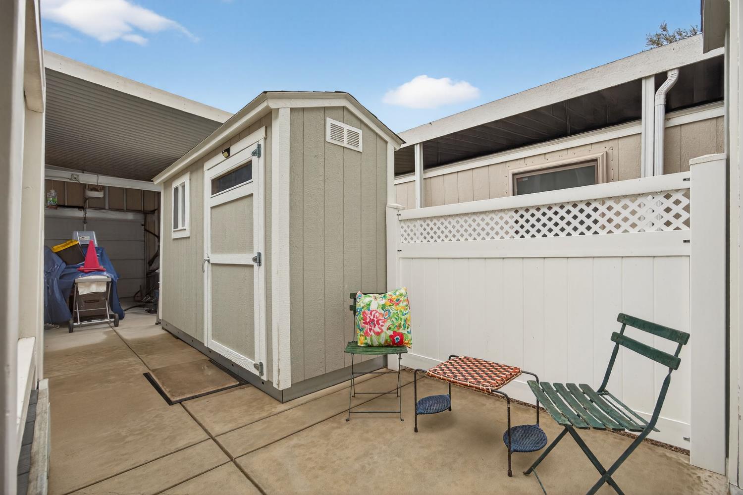 1885 Maricopa Highway, Unit 1 Ojai, CA 93023 - Photo 33 of 36 a living room with a couch and a stove top oven