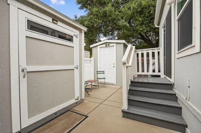 a picture of a bathroom with a shower