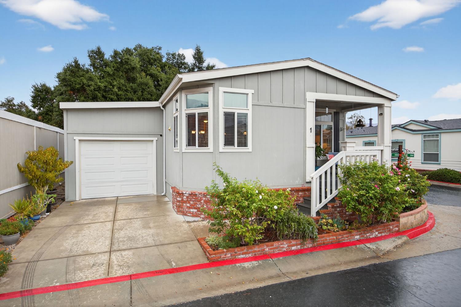 1885 Maricopa Highway, Unit 1 Ojai, CA 93023 - Photo 4 of 36 a front view of house with yard