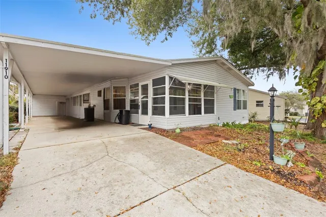 front view of a house with a large window