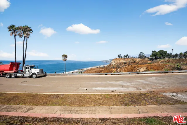 a view of a beach with an ocean view