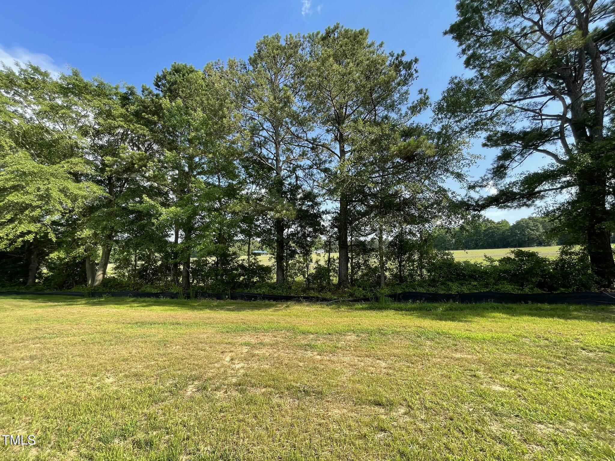 168 Oakfield Trce Drive Four Oaks, NC 27524 - Photo 18 of 19 a view of a swimming pool and an outdoor space