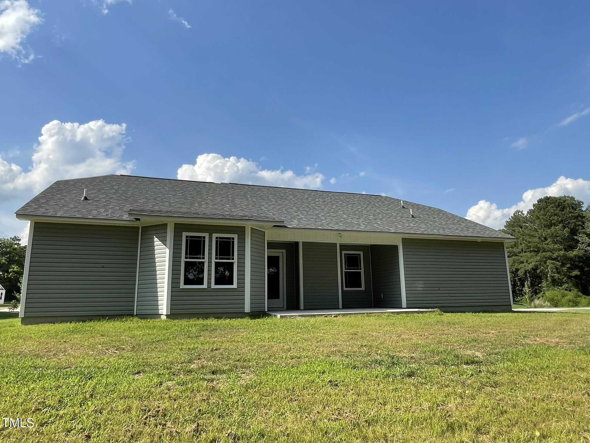 168 Oakfield Trce Drive Four Oaks, NC 27524 - Photo 19 of 19 a view of a house with a yard