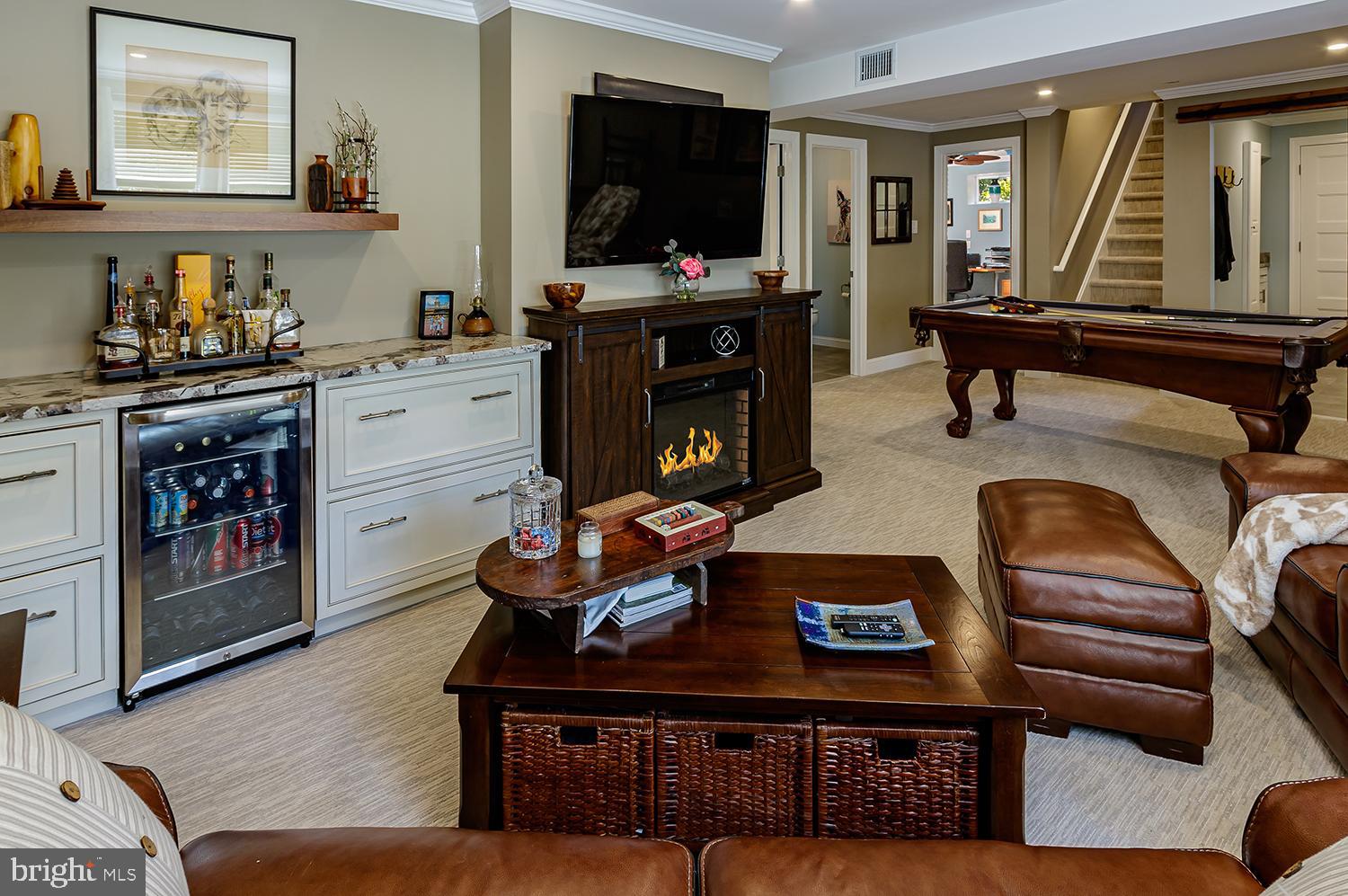 91 Ark Road Lumberton, NJ 08048 - Photo 27 of 46 Family room with bar, fridge & electric fireplace