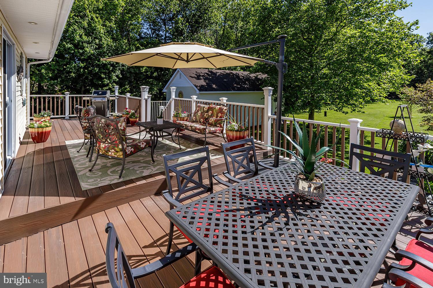 91 Ark Road Lumberton, NJ 08048 - Photo 37 of 46 Maintenance free deck spans the width of the house