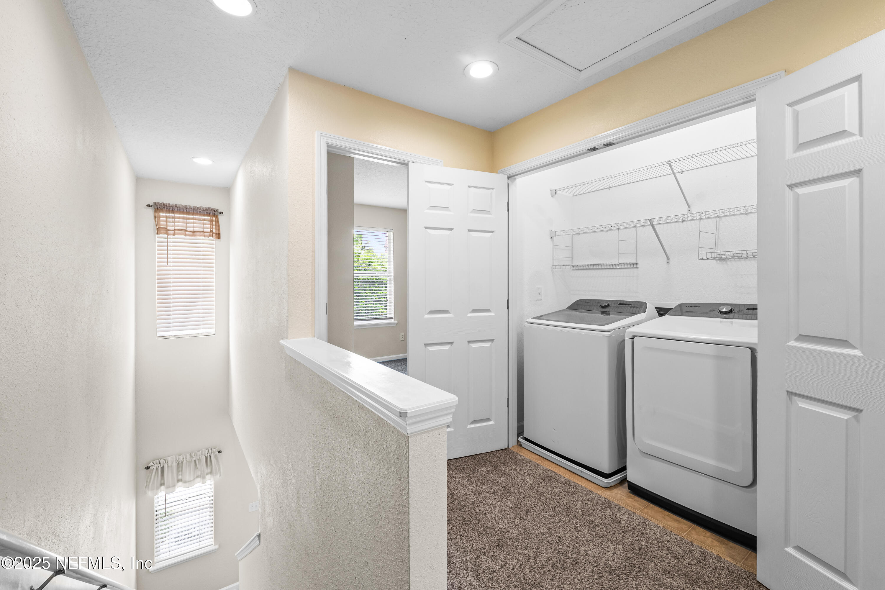 295 Islander Circle St. Augustine, FL 32080 - Photo 22 of 34 a view of utility room with washer and dryer
