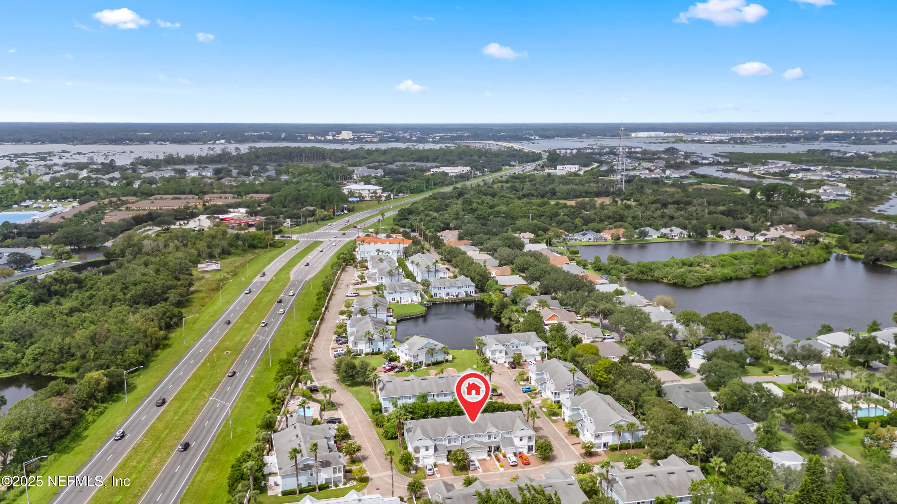 295 Islander Circle St. Augustine, FL 32080 - Photo 3 of 34 an aerial view of city and lake