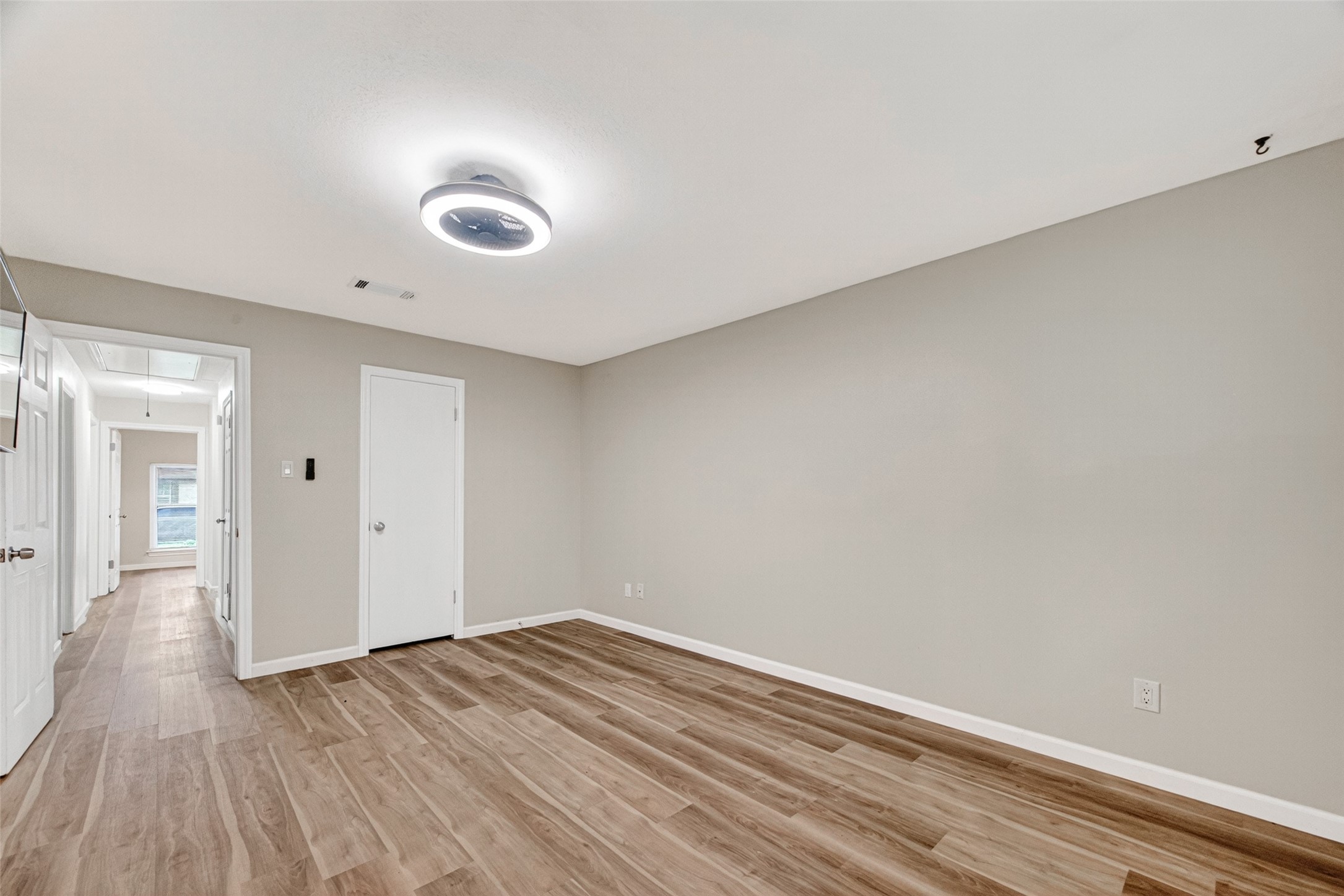 25503 Foxbriar Lane Spring, TX 77373 - Photo 34 of 45 a view of a room with wooden floor and white walls