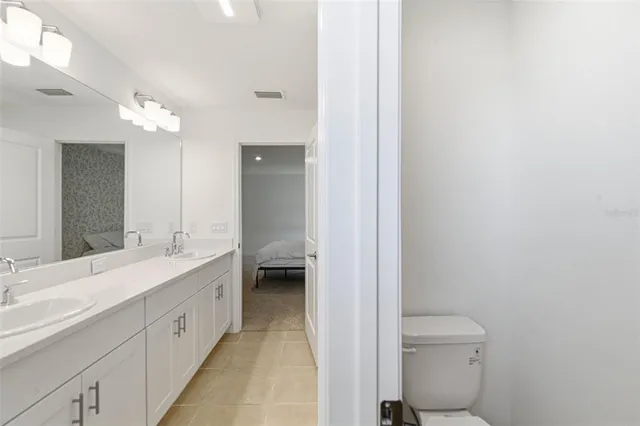 a room with a bed and a window