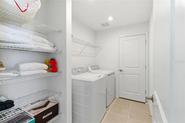 a view of swimming pool patio and outdoor seating