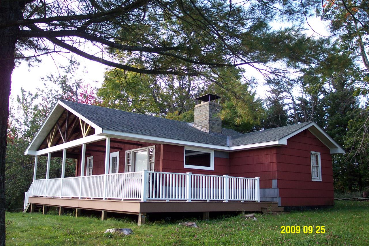 87 Curtin Road Peru, MA 01235 - Photo 1 of 17 a front view of a house with garden