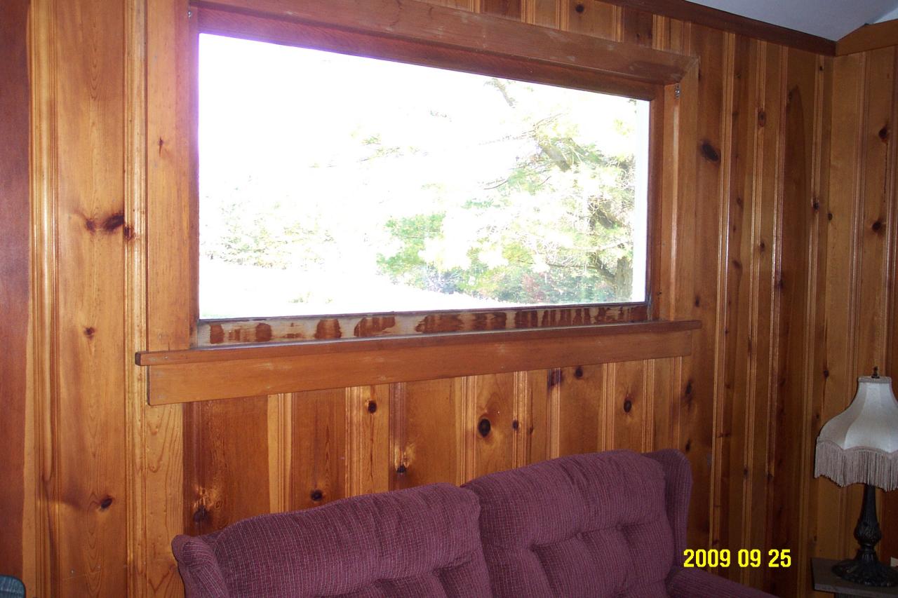 87 Curtin Road Peru, MA 01235 - Photo 12 of 17 a view of a blue chair in front of a door