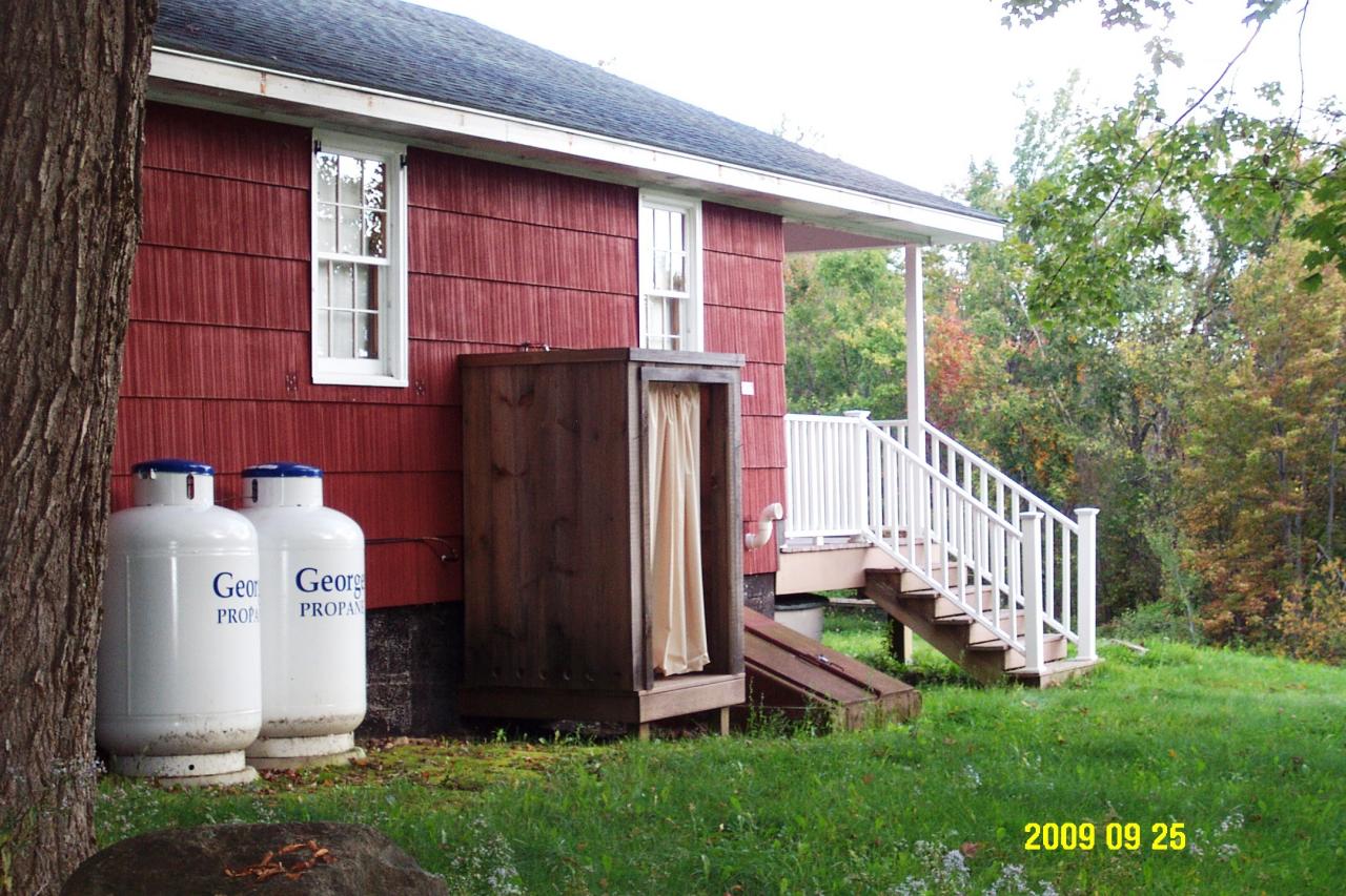 87 Curtin Road Peru, MA 01235 - Photo 4 of 17 a front view of a house with garden