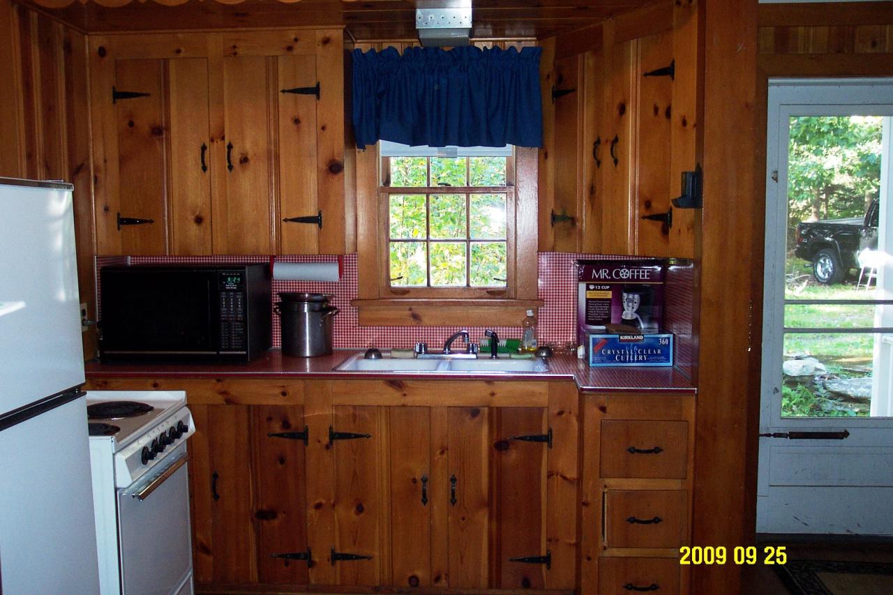 87 Curtin Road Peru, MA 01235 - Photo 9 of 17 a kitchen with stainless steel appliances granite countertop a refrigerator and a stove