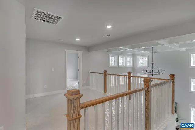 a view of entryway and hall with a window