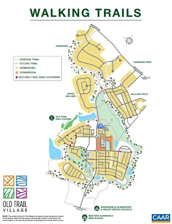 an aerial view of a house with a garden and lake view