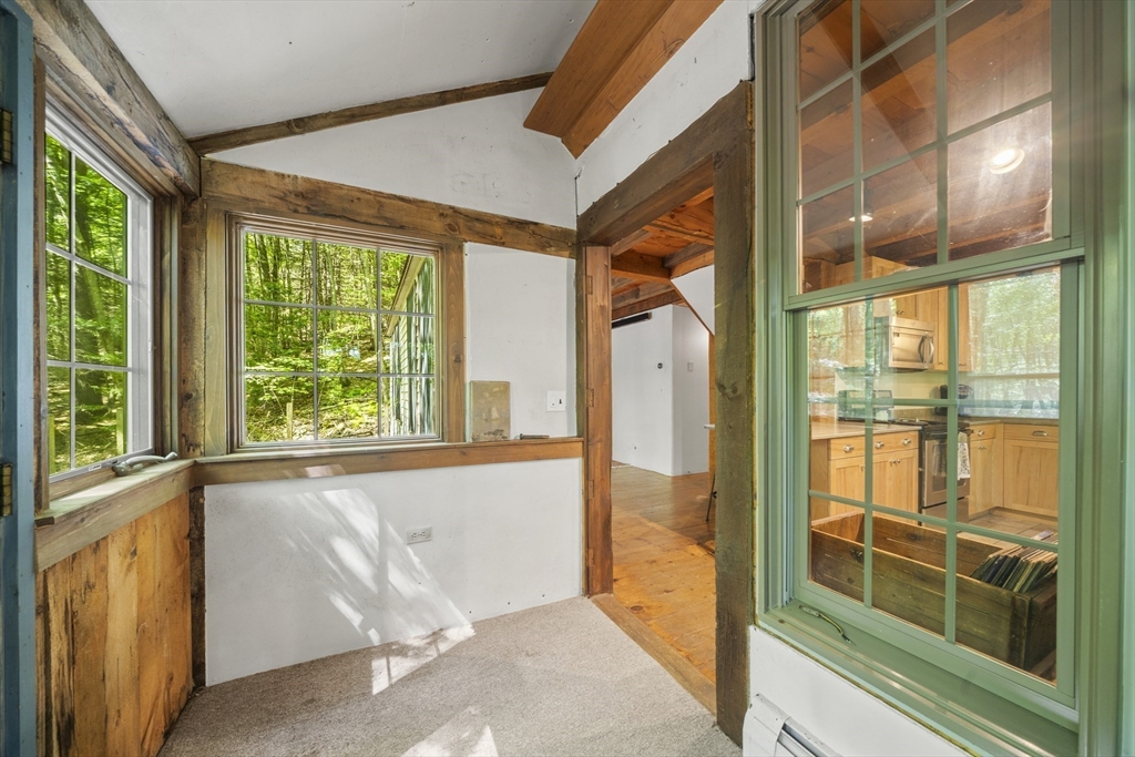 180 Holtshire Road Orange, MA 01364 - Photo 13 of 22 a view of a large door with a glass door