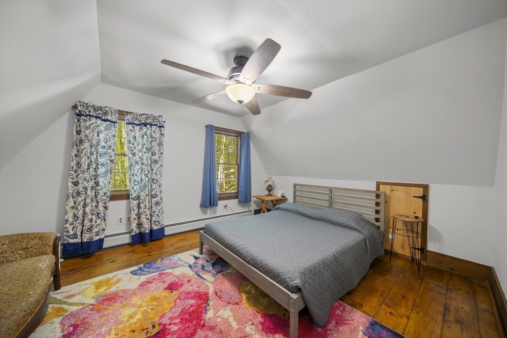 180 Holtshire Road Orange, MA 01364 - Photo 16 of 22 a bedroom with a bed and window