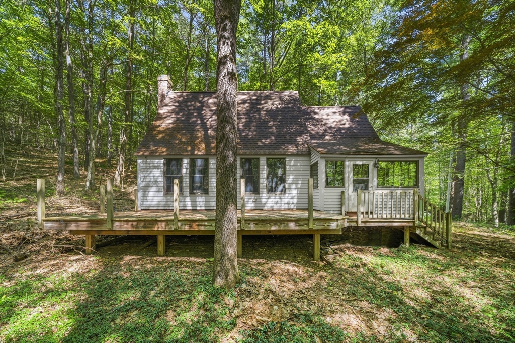 180 Holtshire Road Orange, MA 01364 - Photo 2 of 22 a view of a house with a yard