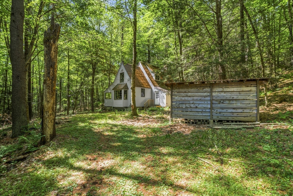 180 Holtshire Road Orange, MA 01364 - Photo 3 of 22 a view of house with backyard