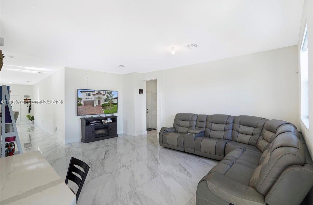10321 Southwest 232nd Street Cutler Bay, FL 33190 - Photo 11 of 49 a living room with furniture