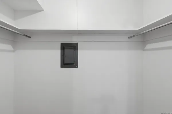 a bathroom with a sink toilet vanity and shower