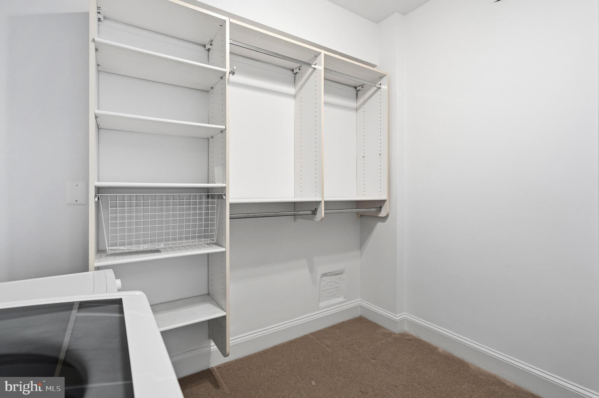 4000 Cathedral Avenue Northwest, Unit 334B/335B Washington, DC 20016 - Photo 15 of 32 a view of walk in closet with empty racks