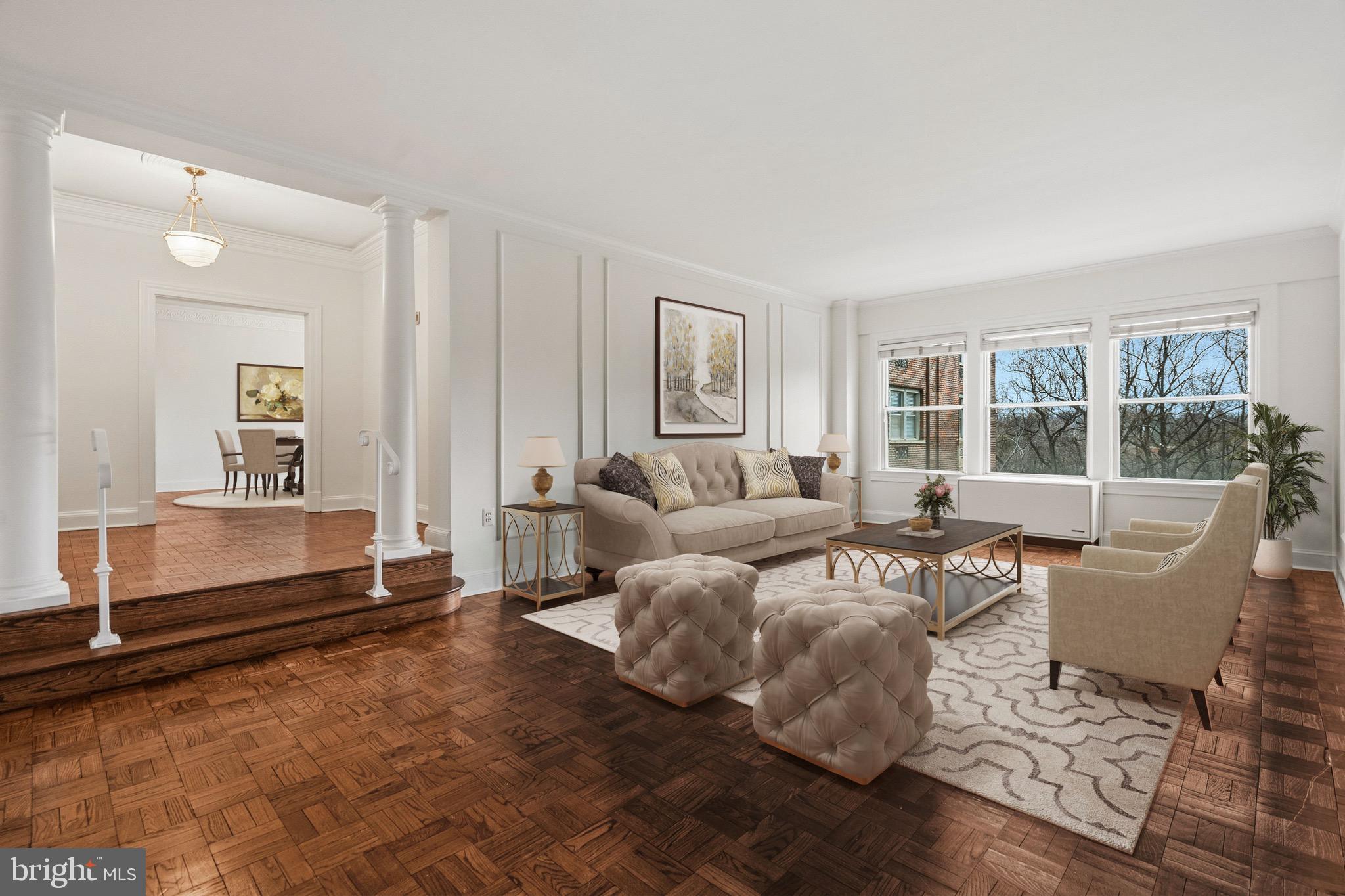4000 Cathedral Avenue Northwest, Unit 334B/335B Washington, DC 20016 - Photo 19 of 32 a living room with furniture and windows