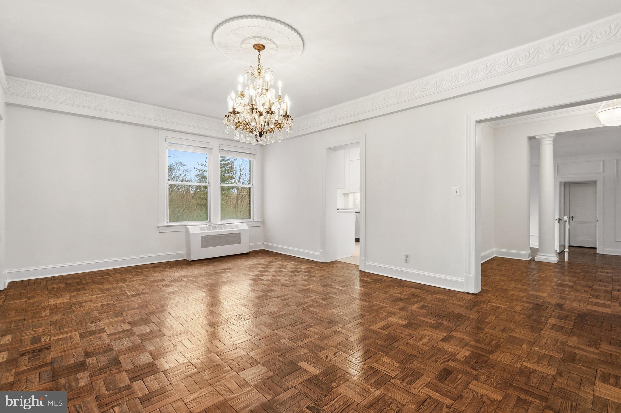 4000 Cathedral Avenue Northwest, Unit 334B/335B Washington, DC 20016 - Photo 3 of 32 a view of an empty room with a window