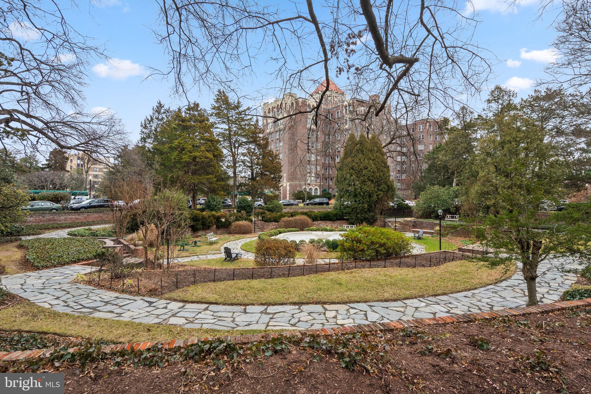 4000 Cathedral Avenue Northwest, Unit 334B/335B Washington, DC 20016 - Photo 31 of 32 a view of a house with a yard