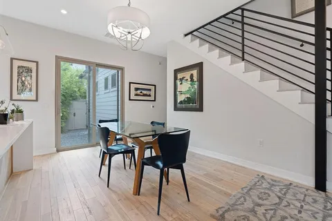 a kitchen with stainless steel appliances a sink stove and refrigerator