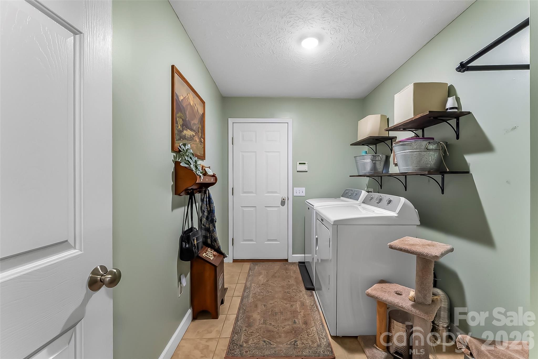 1498 Salem Road Morganton, NC 28655 - Photo 25 of 32 a room with storage and utility