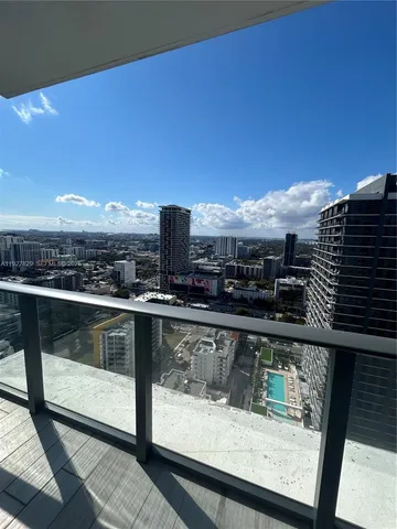 a view of a city from a balcony