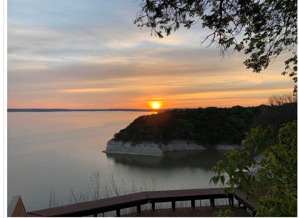 1213 Overlook Court Whitney, TX 76692 - Photo 19 of 29 a view of a lake from a balcony