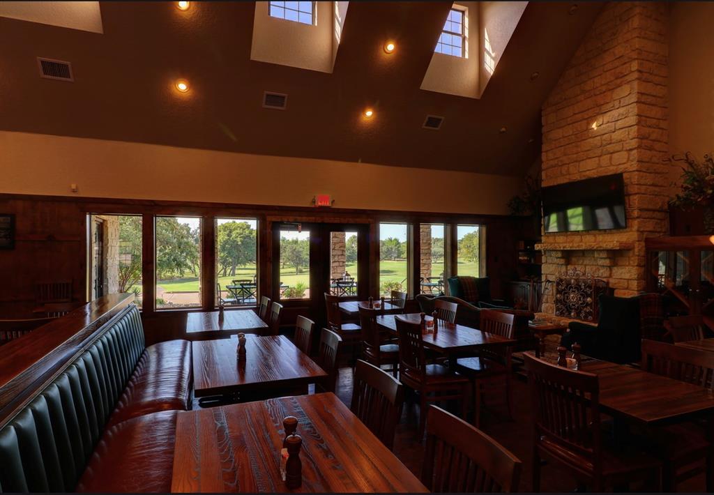 1213 Overlook Court Whitney, TX 76692 - Photo 20 of 29 a view of a dining room with furniture window and outside view